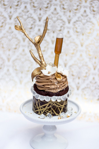 Illustration for article titled Most Expensive Cupcake Contender Is a Beautiful Waste Of Chocolate, Gold